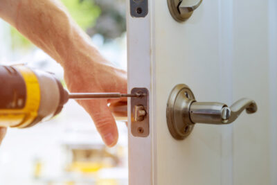 A front door lock is repaired.