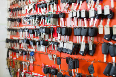 Transponder keys hang on a wall.