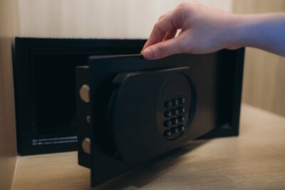 A safe door stands open.